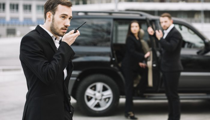 side-view-security-men-working
